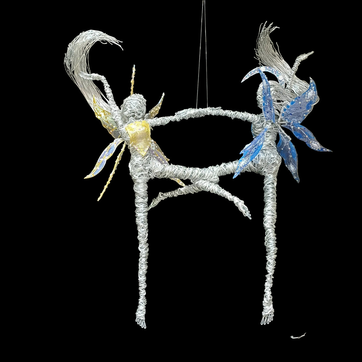 Solara and Lunara dancing fairies